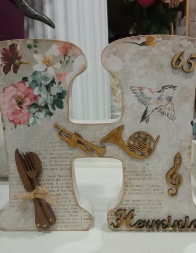 Letra H decorada con elementos